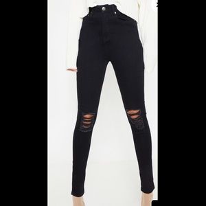Black high waisted ripped skinny jeans